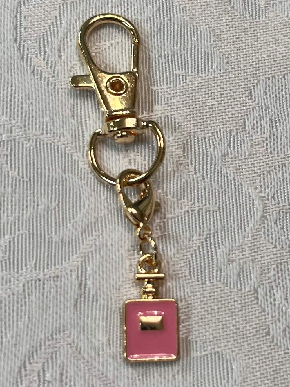 Gold-tone Keychain Charm with Pink Enamel Parfum Bottle